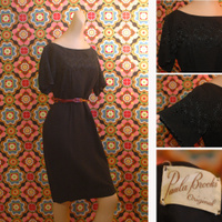 1950's Black hourglass dress with embroidered top